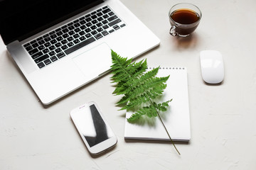 Busines flat lay of office stuff on white table
