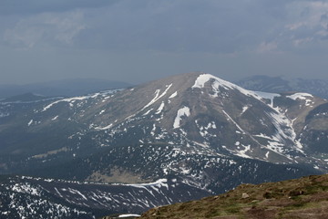 Fototapeta na wymiar Carpathian mountains in the snow, mountain peaks