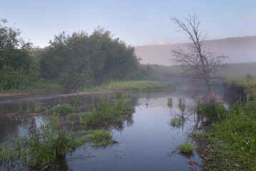 misty morning on the river in the foothills of the Urals