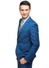 Smiling businessman against white background