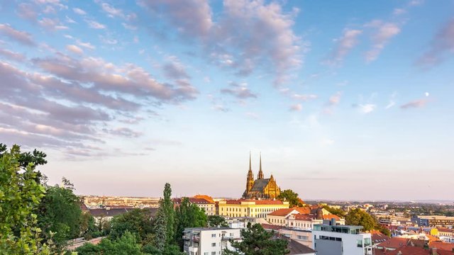 Cathedral St. Peter and Paul, Brno Czech republic. Timelapse video of sunset above the Petrov church. Dynamic clouds, orange and red colors of sunset. Tranquil colors of evening in city.