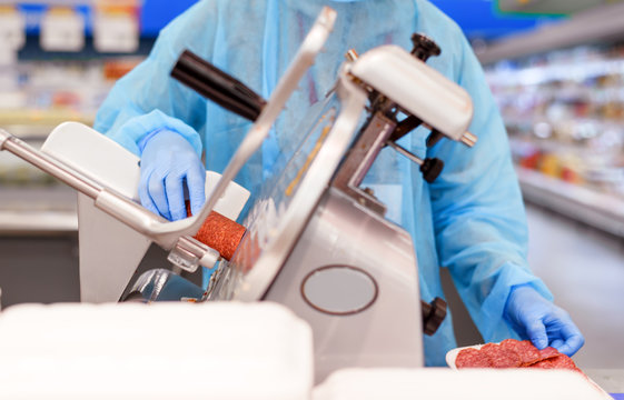 Sale of sausages on the supermarket counter - Powered by Adobe