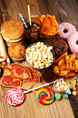 Fototapeta premium Unhealthy products. food bad for figure, skin, heart and teeth.