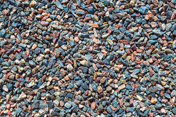 Closeup of colorful crushed pebbles in different colors