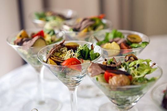 triangular Martini glass with a vegetable salad