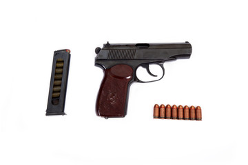 pistol Makarov bullets clip handle set white background isolated brown black star old soviet
