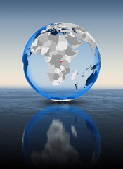 Burundi on globe in water