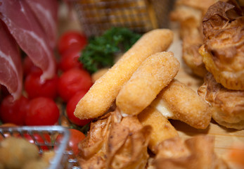 Fried cheese in metal basket served