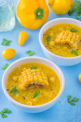 Yellow color cold soup is sweet corn gazpacho