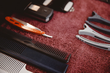 Set of professional equipment for men haircuts barber shop, razor, comb, scissors.