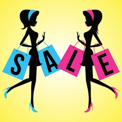 Vector fashion girls with shopping bags with the word Sale .