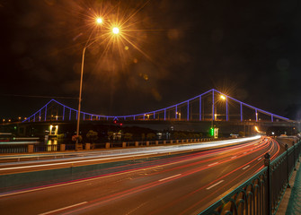 Night road and bridge lights travel city motion