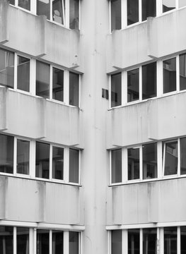 Symmetrical windows creating an interesting background in black and white.