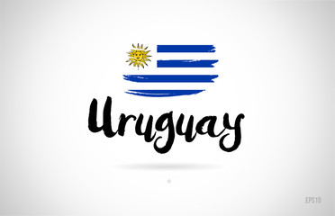 uruguay country flag concept with grunge design icon logo