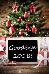 Fototapeta na wymiar Christmas Tree With Goodbye 2018, Red Gifts And Ornaments