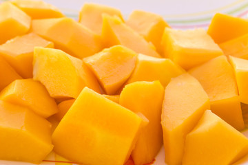 pieces papaya fruit, sweet ripe fresh papaya, raw vegan food.