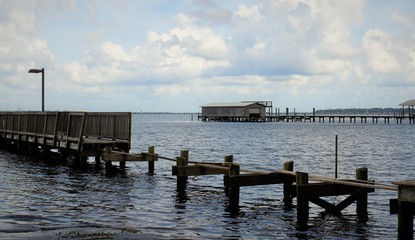 Pier and boathouse damaged by a storm