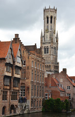 Fototapeta na wymiar Old buildings near canal in Brugge, Flanders, Belgium