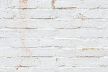 Old brick wall painted white