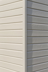 Fototapeta premium house insulation. View of a finsh,house Wall corner construction with insulating wood cladding