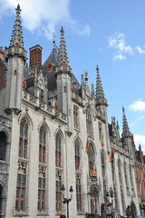 Fototapeta na wymiar Bruges, Belgium - August 25, 2018: City Hall in the Old Town of Bruges, Belgium