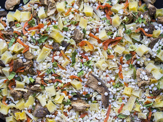 Detail top view of dry vegetable soup ingredients.  Dried vegetables, mushrooms, cereals colorful mix.