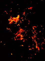 Flame of fire with sparks on a black background