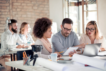 Group of business partners discussing ideas