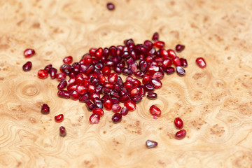 delicious berry pomegranate on a wooden table