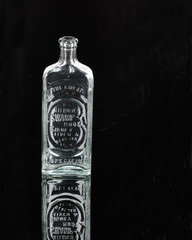 Antique Glass Bottle Black Background