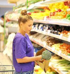 Woman buying vegetable at the market