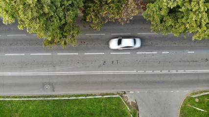 View of the road and car from the air.
