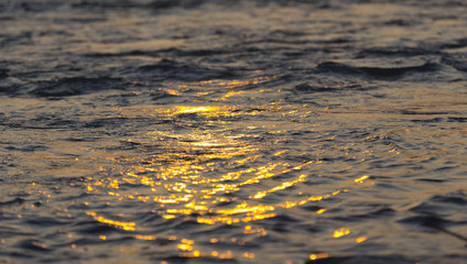 the stream of water at sunset time