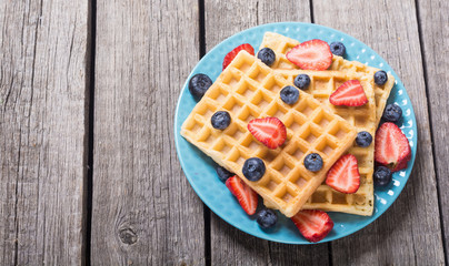 Belgian waffles with strawberry and blueberry