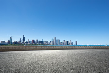 asphalt highway with modern city in chicago