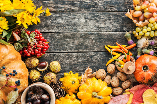 Happy Thanksgiving day concept - traditional holiday food with pumpkins on old wooden. 