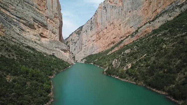 Aerial footage of a river beetwen the mountains. Congost de Montrebei, Lleida (Spain)