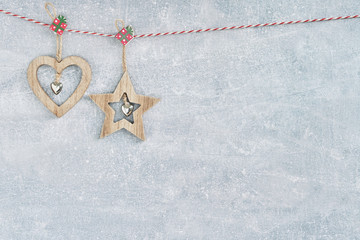 Christmas background. Christmas heart and decoration on gray background. Copy space