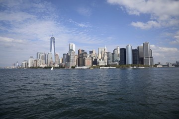 Naklejka premium The Downtown Manhattan Skyline in NYC from the Lower New York Bay