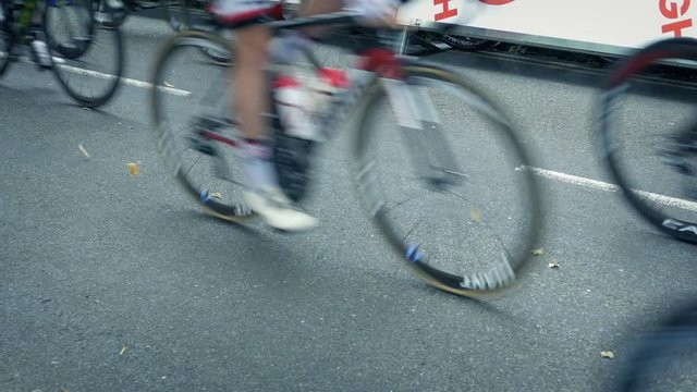 Cyclists In Race Passing Fast