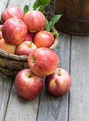 Fresh Red Apples on a Rustic Wooden Surface