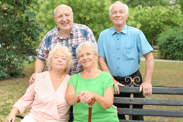 Elderly people spending time together in park