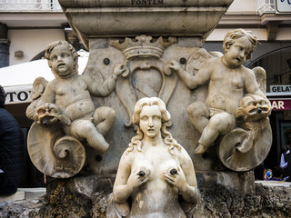 Fountain below the Cathedral with Statue of St Andrew with Nymphs and cherubs in the Centre of Amalfi Italy