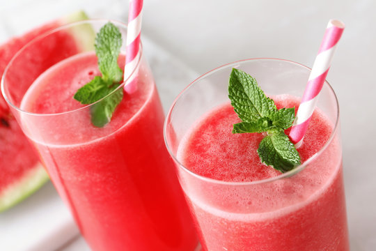 Tasty summer watermelon drink with mint in glasses, closeup