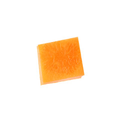 Piece of ripe carrot on white background