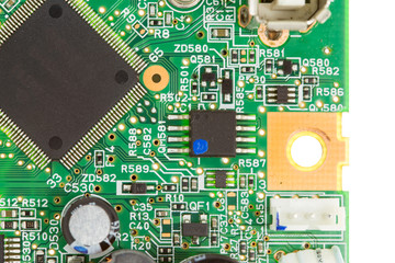 a close-up of a printer board as an abstract electronic background. green