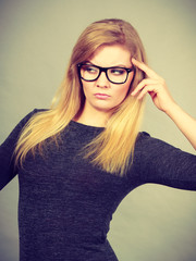 Closeup of woman thinking face expression