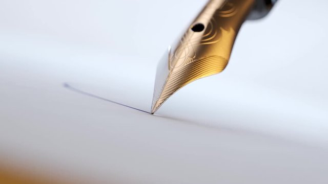 Close up of a quill pen making a check sign with ink in an empty bracket. 4K HD