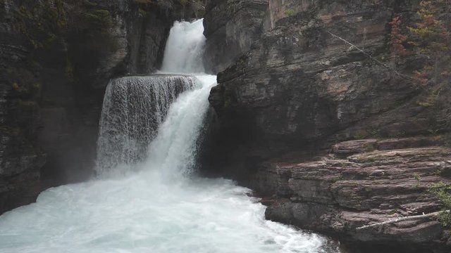 a 17% slow motion close up shot of st mary falls at glacier national park in montana, usa