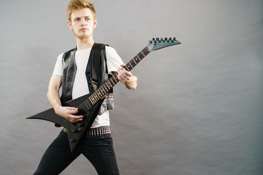 Man playing on electric guitar